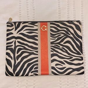 C. Wonder Printed Clutch with Stripe Detail